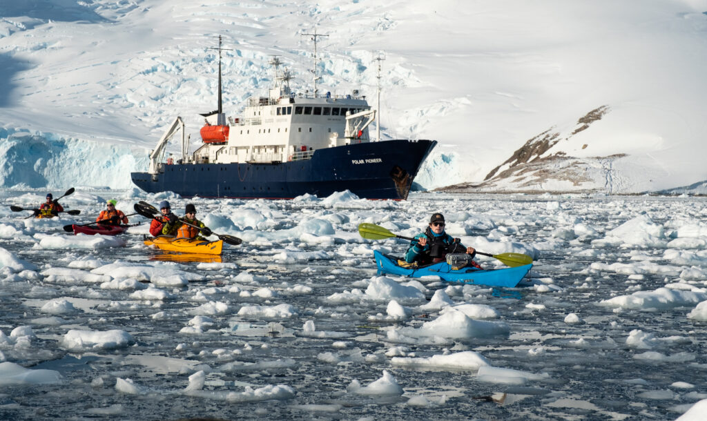 Ship in Antarctica with kayakers