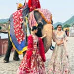 Elephant in India dressed up with costumed ladies